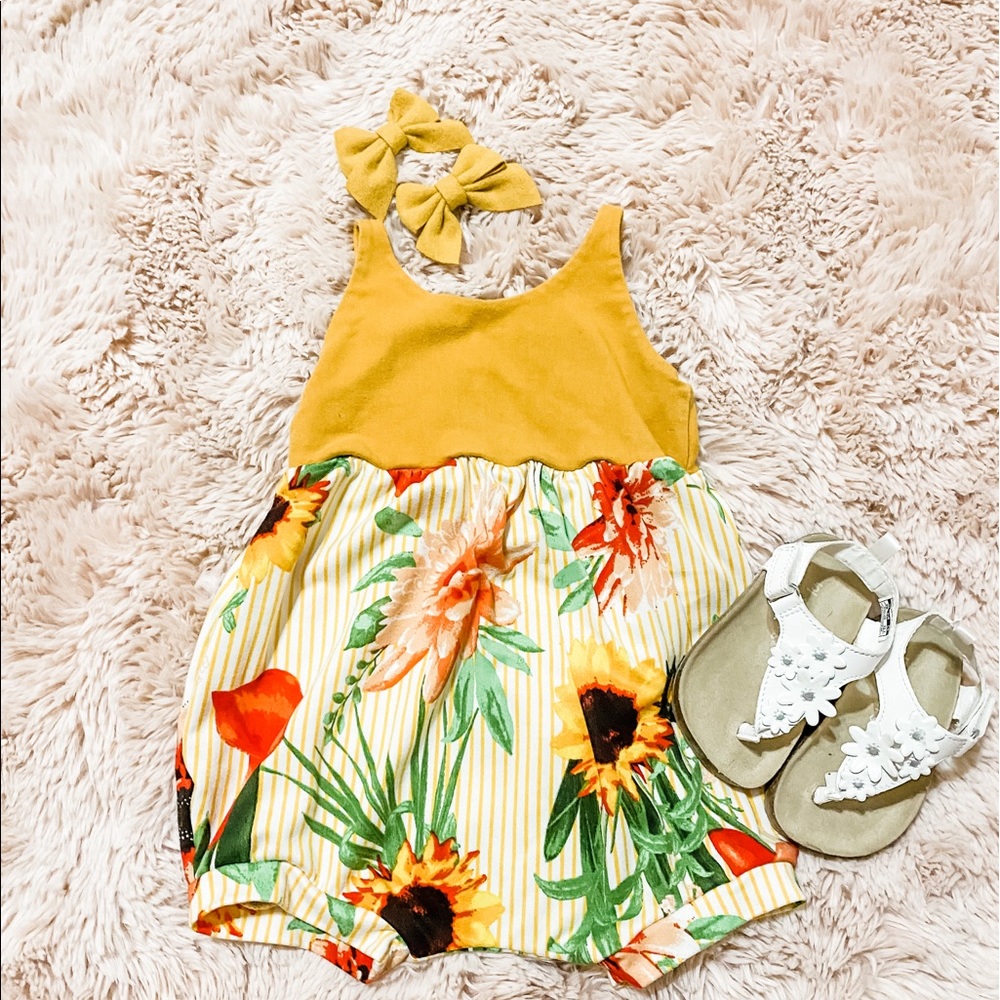 Small shop romper! Small shop is from bow to bum!